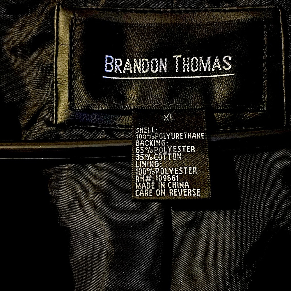 Black Brandon Thomas Jacket has lots of zippers that work. Like new .